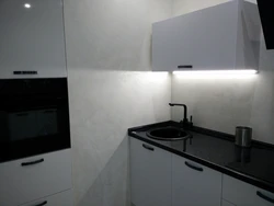 White kitchen black sink photo