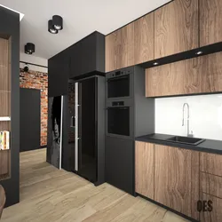 Black refrigerator in the kitchen interior