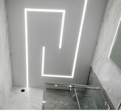 Light lines on a suspended ceiling photo in the bath