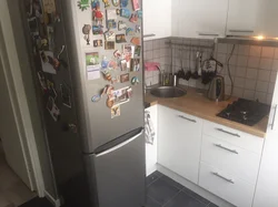 Kitchen design with sink next to refrigerator