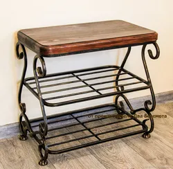 Forged shoe rack in the hallway photo