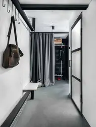 Instead of a door to the dressing room there is a curtain photo of the interior