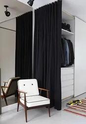 Instead of a door to the dressing room there is a curtain photo of the interior