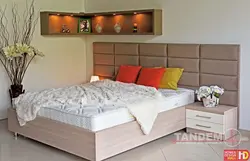 Photo of a bedroom with a bed and bedside tables