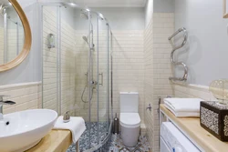 Renovation of a bathroom in Khrushchev, photo combined with a shower stall