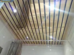 Ceiling made of aluminum panels in the bathroom photo