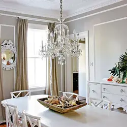 Chandelier in the kitchen in a classic interior