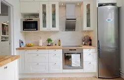 Furniture for a small kitchen with a refrigerator photo