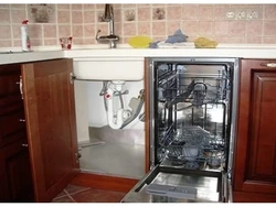 Dishwasher under the kitchen sink photo