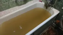 Photo of a rusty bathtub