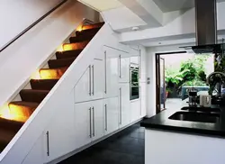 Kitchen under the stairs photo