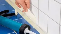Bathtub sealant photo