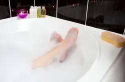 Photo of hand in bath