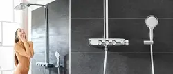 Photo of a watering can in the bathroom