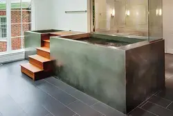 Bathtub with step photo