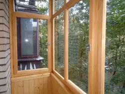 Wooden windows on the loggia photo