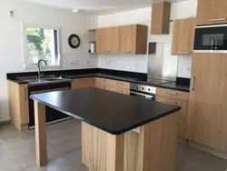Kitchens with compact stove photo