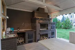 Summer kitchen with stove photo