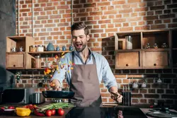 Man Cooking In The Kitchen Photo