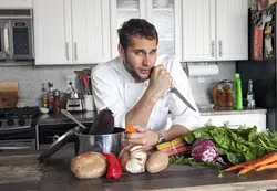 Man cooking in the kitchen photo