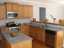 Kitchen With Red Countertop Photo