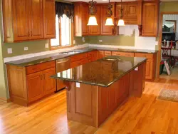 Kitchen With Red Countertop Photo