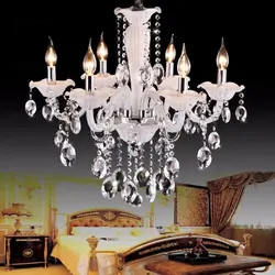 Crystal chandeliers in the bedroom photo