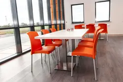Orange chairs in the kitchen photo