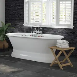 Cast iron bathtub with screen photo