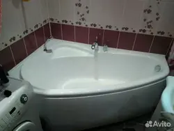 Змяшальнік на кутнюю ванну фота