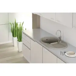 Бежевая мойка на кухне фото