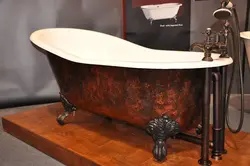 Cast iron bathtub with legs photo