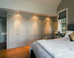 Tall wardrobe in the bedroom photo