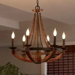Wooden chandeliers in the living room photo