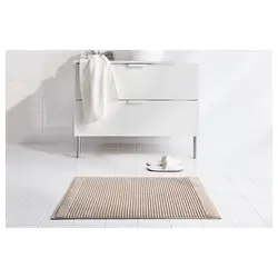 Beige bath mat photo