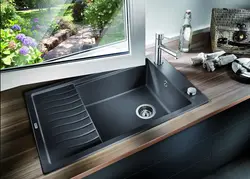 Cast kitchen sinks photo