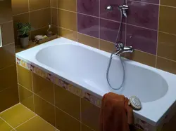 Фота ванны з кранам пасярэдзіне