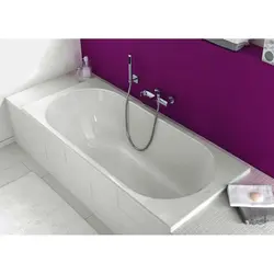 Photo of a bathtub with a tap in the middle