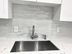 Gray mosaic tiles in the kitchen photo