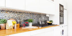 Gray mosaic tiles in the kitchen photo