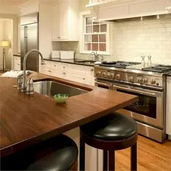 Kitchen with oak countertop photo