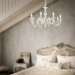 White chandelier in the bedroom photo