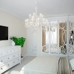 White chandelier in the bedroom photo