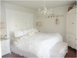 White chandelier in the bedroom photo