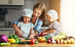 Little girl in the kitchen photo