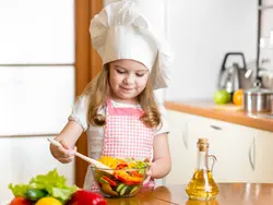 Little Girl In The Kitchen Photo