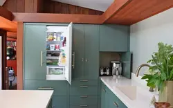 Cabinet above the refrigerator in the kitchen photo