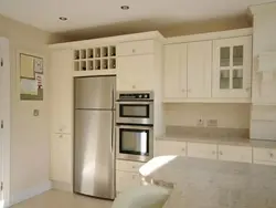 Cabinet Above The Refrigerator In The Kitchen Photo