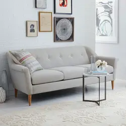 Sofa with legs in the living room photo