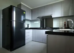 Gray kitchen with black handles photo